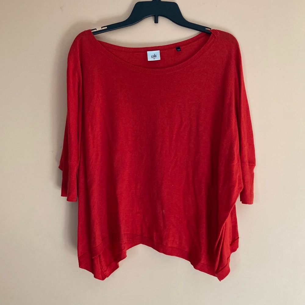 Red cabi loose draping comfy sits at top of hip